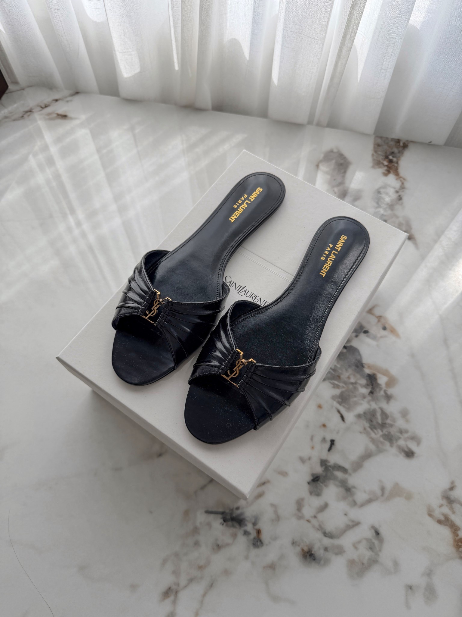 I sized up to EU41

Feels like a contradiction as we’re walking straight towards winter but sandals are basically a year round essential for me 🥰 (but also, these are perfect if you have a mid-year summer holiday planned! 👀🏝️)

Such a chic update to my more vintage inspired tribute flat sandals (also YSL) which I bought 6 years ago

@netaporter *always* has the best shoes - have put together an edit of my faves (including these, ofc) 