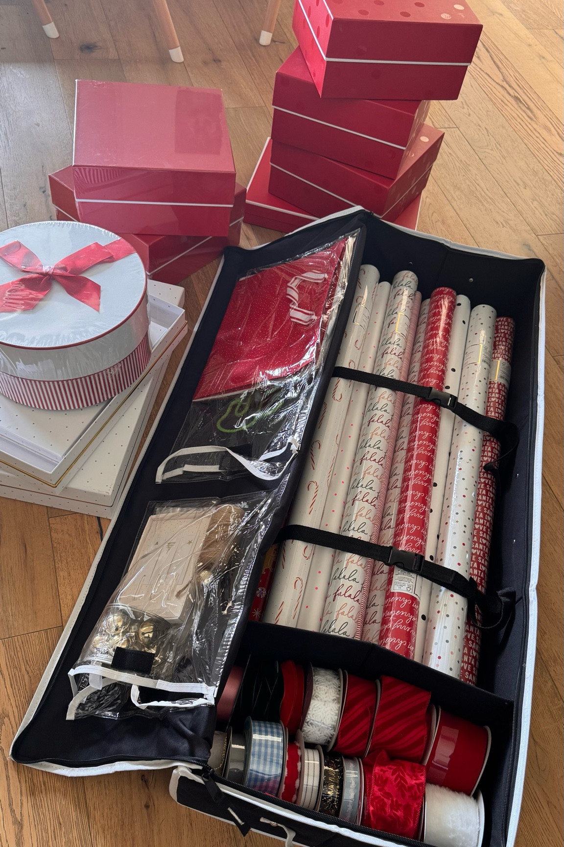 This is the wrapping paper and bows we use every year! Anything Sugar Paper is the best! If you don’t feel like wrapping, I love their ready-to-give boxes too. 

And get this gift wrap organizer!!! 

#LTKGiftGuide #LTKHoliday #LTKSeasonal