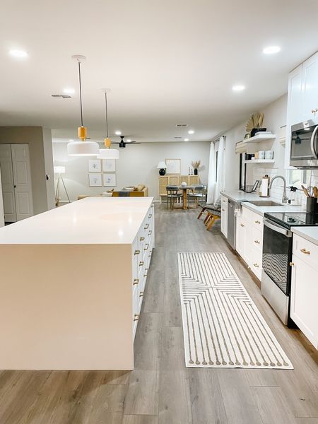 A mid-century modern kitchen with a beautifully functional washable rug!

#washablerug
#ruggable
#neutralrug
#midcenturykitchen

Ruggable rug, white kitchen, shelf styling, breakfast nook, open concept, lighting

#LTKFind #LTKhome