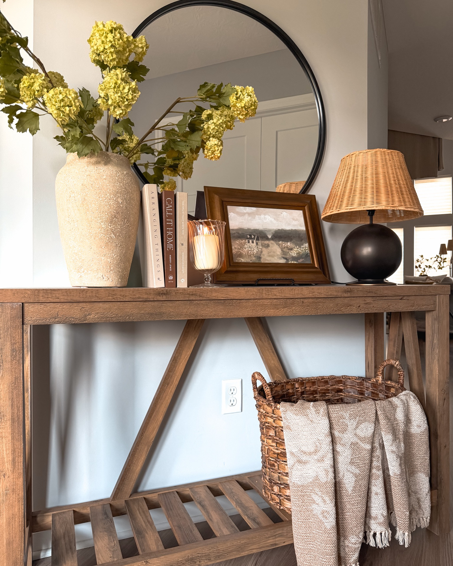 Entryway views

Entryway styling, foyer, hallway, console styling, table styling, vase styling, faux tree, planter, round mirror, table lamp, indoor rug, front door, Amazon finds, Target finds, coffee table books, faux florals, Wayfair finds

#LTKHome