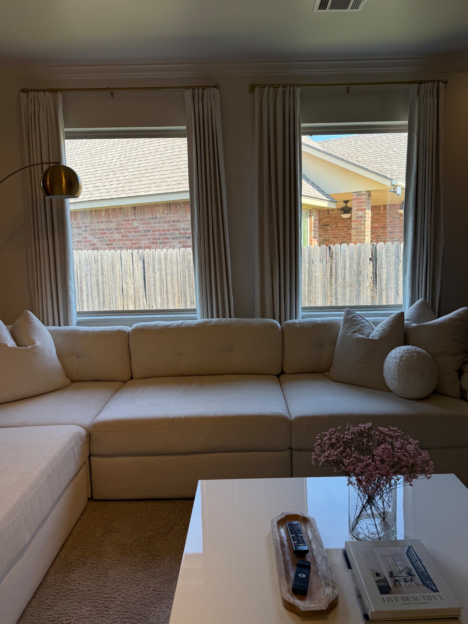 Adding curtains transformed our living room!😍 we got the color natural linen! 

#LTKSeasonal #LTKFindsUnder100 #LTKHome