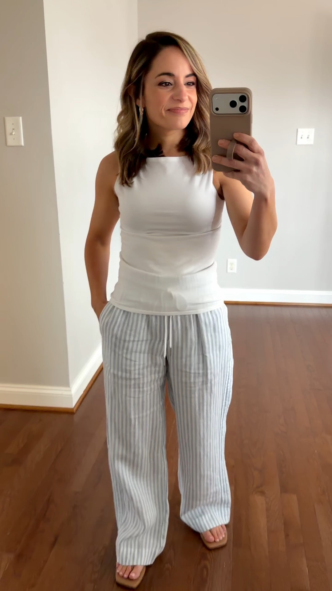 A closer look at the cotton jersey Quince t-shirts. These are some of my personal favorite tops that I wear often but I get a lot of questions abut them so here are a few answers to common questions. 

These tops are stretchy and have a slim fit, you may want to size up if you don’t like a close fit. (I’m wearing xs) I typically wear these tucked in, untucked they come to my mid hip. 

I’m wearing a nude bra that matches my skin color with them here, no other layers and I wouldn’t consider them to be see through.  However, you can see how over my pants you can see the print of the pants, so the color of the undergarments matters with these tops. 

I find these to wash well, of the two styles I prefer the boatneck style and wear it the most often. 

Pants Blue and White (Quince): xs (28” inseam option) 
Pants Red and Whjte (Target): xs short (28” inseam) 

#LTKPetite