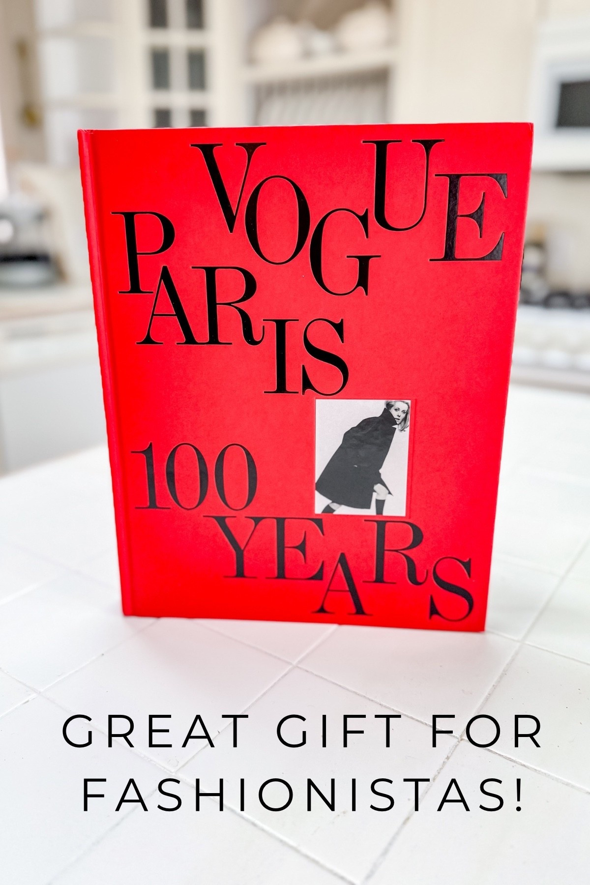 Vogue Paris 100 Years coffee table book is a great gift for fashionista‘s. The photographs are so interesting and the commentary so riveting, I haven’t finished the book yet!

#LTKGiftGuide #LTKHoliday #LTKCyberWeek