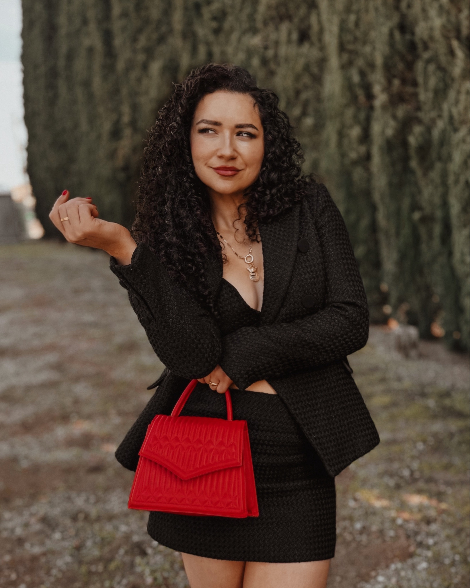 In my power suit era. Black tweed skirt, blazer and bralette  from Bardot. Anthropologie gold traveler charm necklace. #revolve #red #anthropologie 

#LTKMostLoved 

#LTKtravel