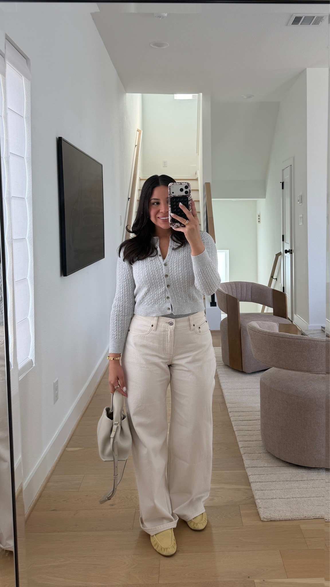 Office to happy hour outfit 
Cardigan: xs 
Jeans: 26 short 
Slip on loafers: 6.5 
White bag

#LTKgrwm #LTKootd #LTKWorkwear