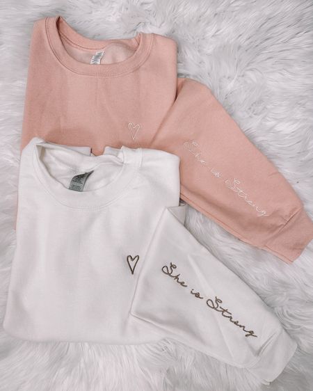 Embroidered sleeve she is strong sweatshirt. In blush pink or white

#LTKunder50 #LTKFind #LTKstyletip