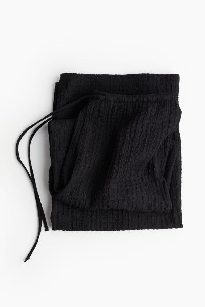 Textured jersey trousers - Black - Ladies | H&M GB | H&M (UK, MY, IN, SG, PH, TW, HK)