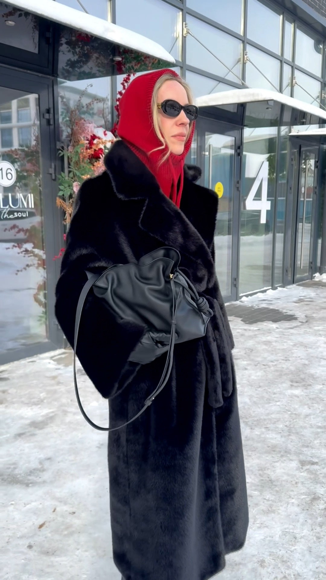 Black faux fur coat, shearling coat, red balaclava, all black winter outfit, lug sole riding boots, Loewe Flamenco pouch handbag 

#LTKOver40 #LTKSeasonal #LTKootd