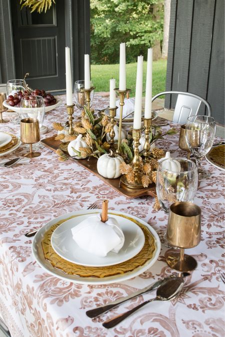 Fall table setting, pumpkins, tablecloth, candle sticks, place setting, napkins, faux stems, patio furniture 


#LTKHoliday #LTKSeasonal #LTKhome