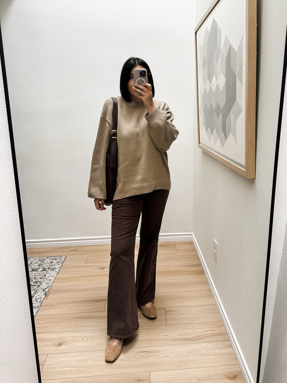 I'm in the medium of the sweater -- it runs big! I'm in the 30 of the jeans.  

 