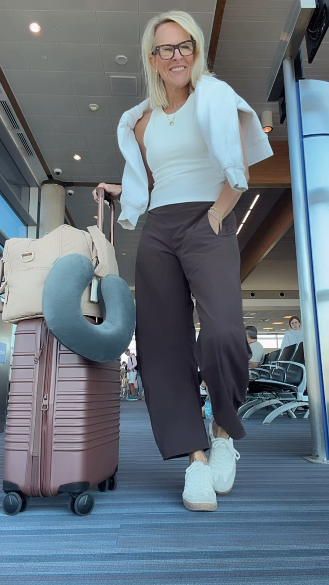 Of course traveling in my @Ruti pants! Absolutely a dream travel outfit . And now in new colors. Grabbed these brown 

Currently 15% off and can always use code CINDYS15 for 15% off too 

Pricey, yes, but they are like none other! The fabric does NOT wrinkle, 
Which is an amazing bonus!! the feel and flow of it is perfect 

You will wear over and over and over! Making the cost per wear go down 
10/10 love these pants 

Fit is tts. I’m in size 6
#sponsored

#LTKootd #LTKTravel #LTKOver40