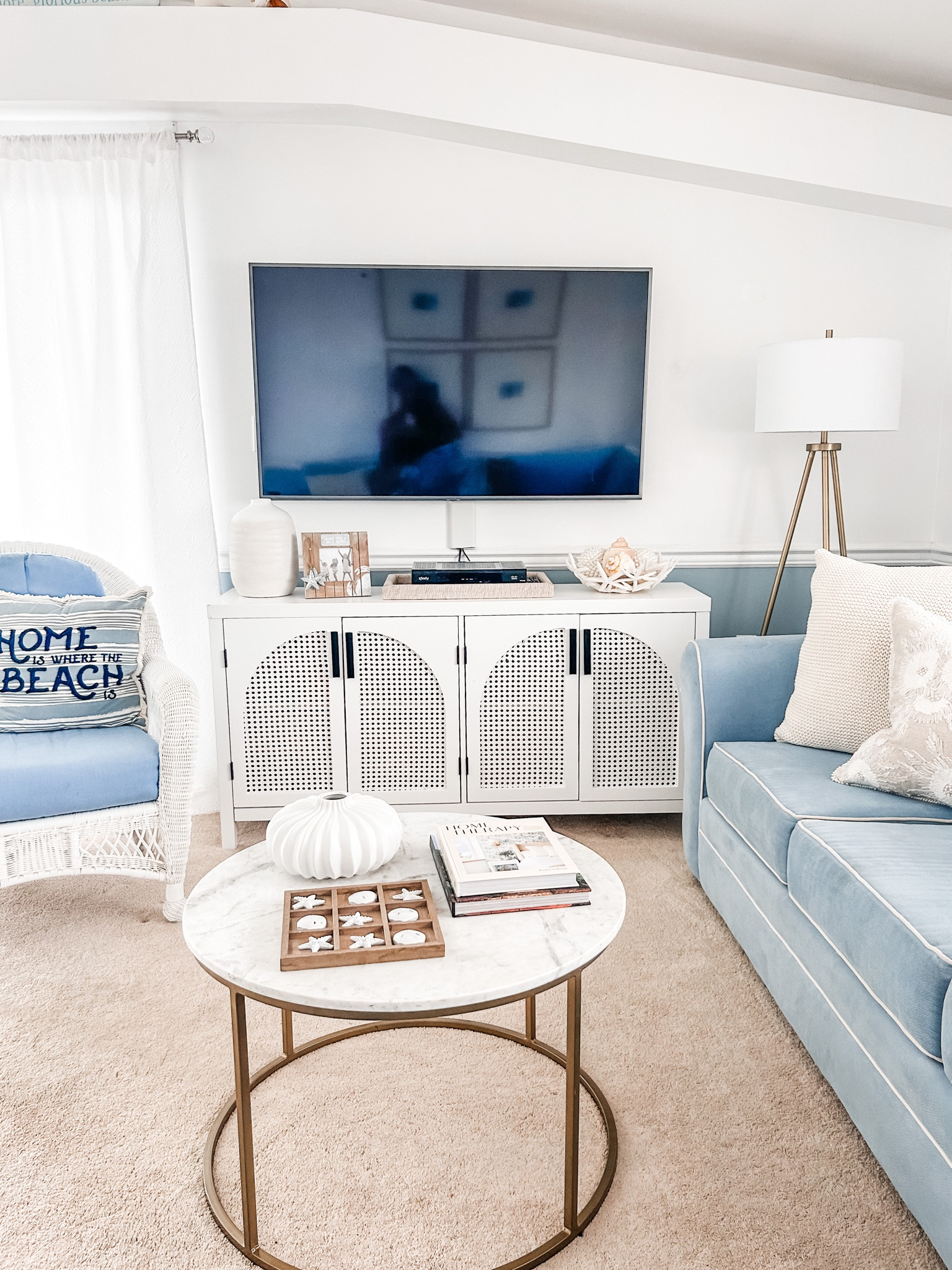 Love our new media console table from Amazon for our beach condo!

White media console with caned doors, caned cabinet, console table, media table, tv table, white console table, rattan table, round coffee table, tripod lamp, brass floor lamp, white sideboard, console table with storage, caned console. Arched cabinet.

#amazon

#LTKstyletip #LTKFind #LTKhome
