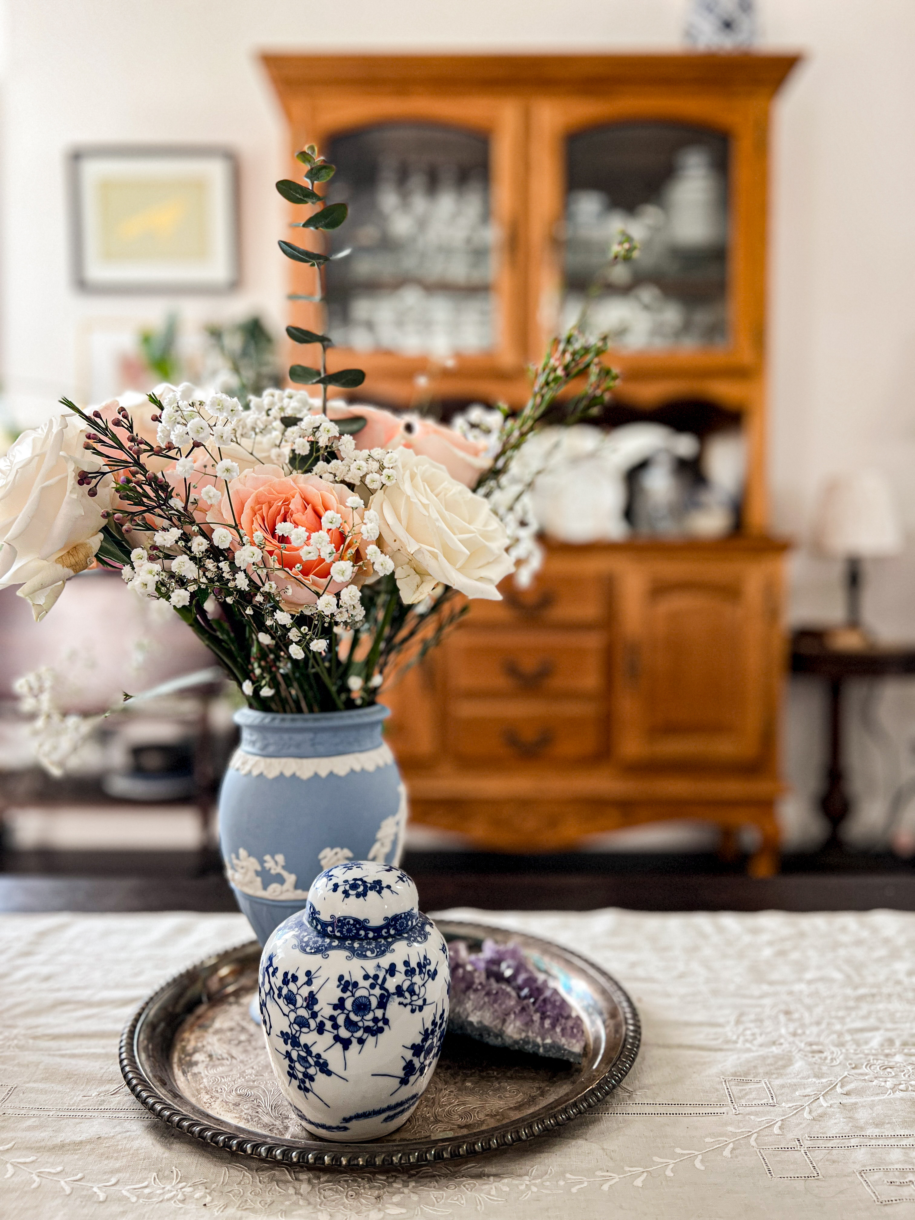 A vintage silverplated tray is a great way to gather together a few items for a pretty vignette. The tray helps keep them feeling cohesive, so it doesn't just look like a pile of random things plopped on a table.  

 #LTKHome #LTKFindsUnder50 #LTKFindsUnder100