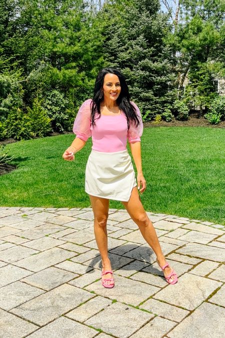 Pink bow sandals with a block heel
Faux leather skort


#LTKstyletip #LTKshoecrush #LTKfindsunder50