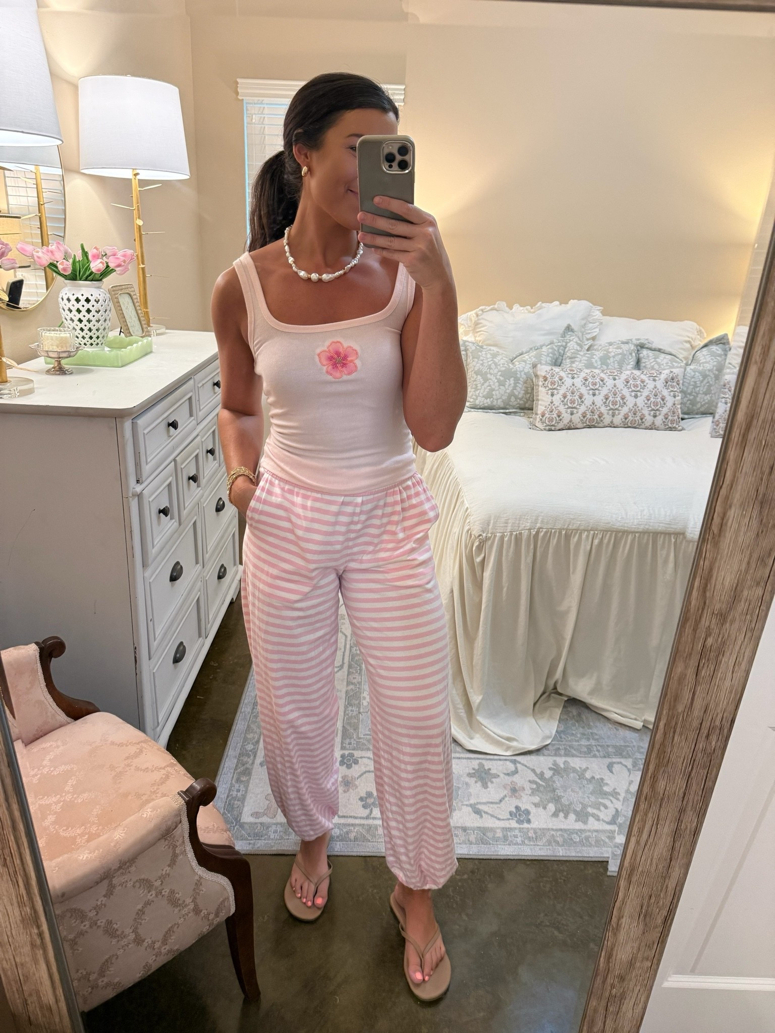 The cutest tank from target!! Several options! Love the beaded tank trend this summer! Size down in it! I’m a true size medium and wearing a small! My necklace is from Target also but I linked similar ones that are part of Amazon prime week sales! These flip flops are so comfy!! Been wearing all summer! They are my go to! Jogger pants are CoColily’s but can’t link them on here!
