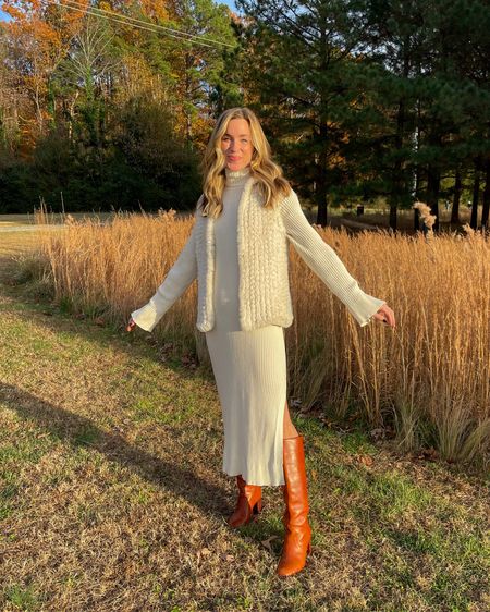 Family photo dress back in stock in new colors! Size S in dress. Exact boots run TTS. Two similar vests linked and similar boots.

#sweaterdress #fauxfurvest #familyphotooutfit 

#LTKsalealert #LTKfindsunder100 #LTKSeasonal