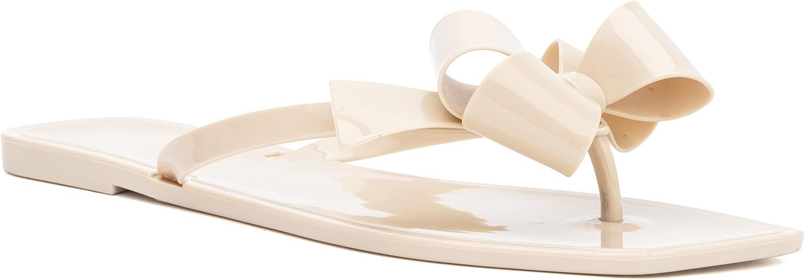 Olivia Miller Women’s Fashion Ladies Shoes, PVC Jelly w Bow & Thong Flip Flops Style Slip On Op... | Amazon (US)