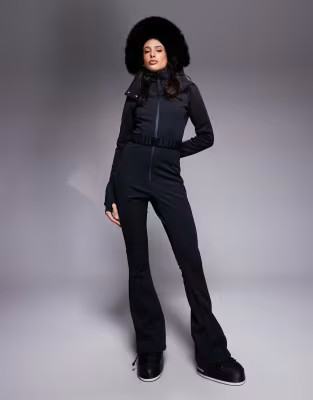 ASOS 4505 Tall Ski soft shell belted ski suit with slim kick leg and faux fur hood in black | ASOS (Global)