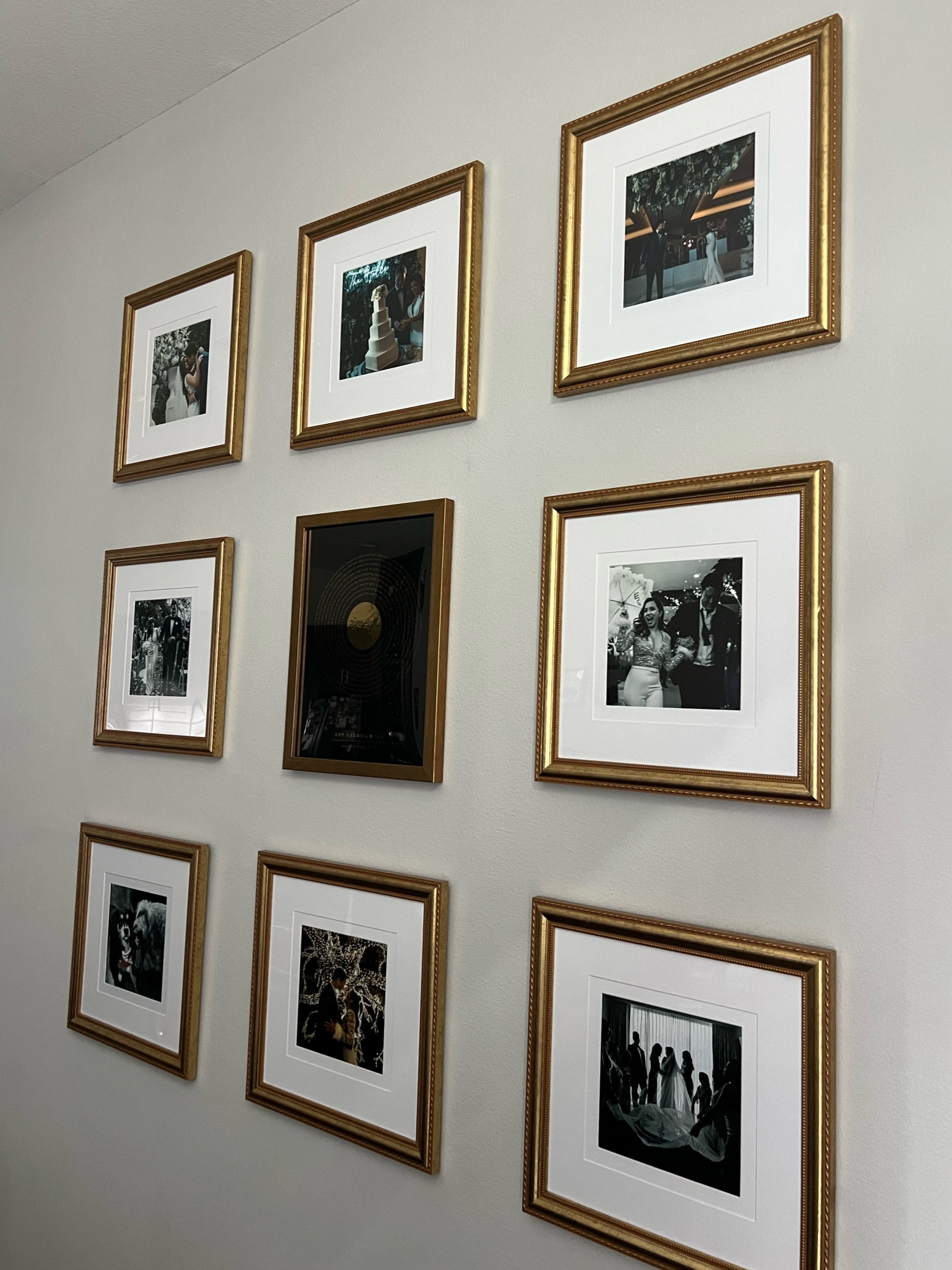 Gallery frames for our wedding pictures with our first dance song art in the middle! 

#LTKWedding #LTKHome #LTKFindsUnder100