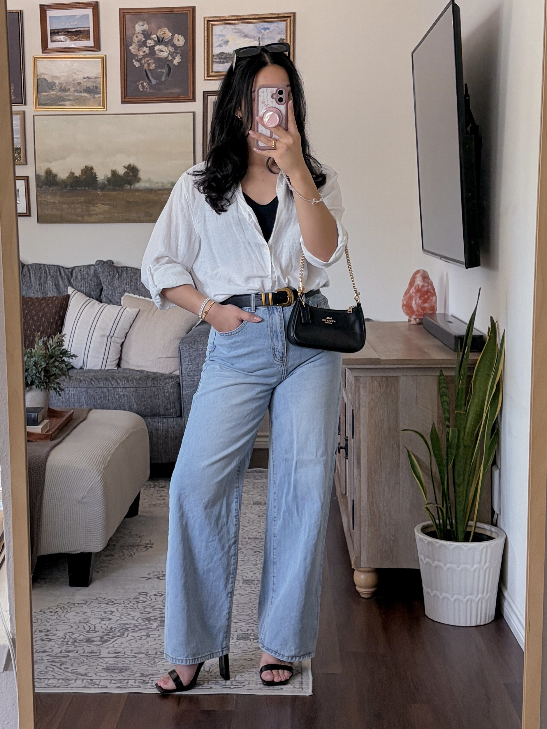 white button down outfit, white shirt outfit, oversized button down outfit, linen shirt outfit, light wash jeans outfit, wide leg jeans outfit, jeans and heels outfit, black heel sandals outfit, black shoulder bag outfit, casual chic outfit, effortless style, elevated everyday outfit, timeless outfit inspo, classic wardrobe staples, capsule wardrobe outfit, neutral outfit inspo, old money aesthetic, quiet luxury style, minimalist fashion, chic summer outfit, classy casual outfit, everyday chic style, model off duty look, polished casual outfit, french girl inspired style, layered jewelry outfit, black accessories outfit, outfit ideas, ootd, style inspo, fashion inspo 2026, everyday style, mirror selfie outfit, casual date outfit, brunch outfit inspo, work to dinner outfit, versatile outfit ideas, wardrobe essentials, elevated basics outfit, clean girl aesthetic, classic style outfit, monochrome accessories, effortless elegance style  

 #LTKxAbercrombie #LTKdayinmylife #LTKgrwm