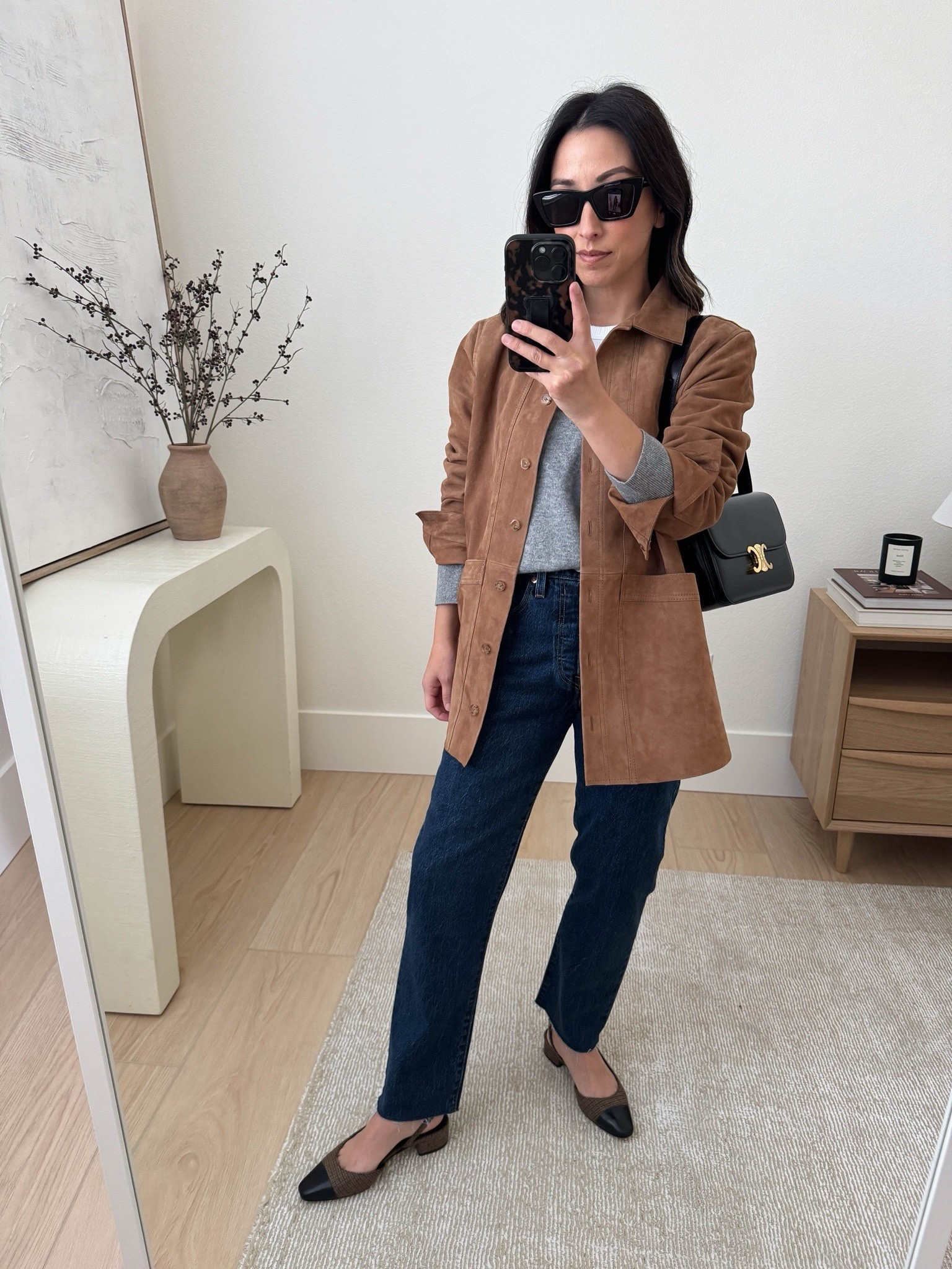 Sezane Suede Will jacket multiple ways. Best suede jackets. Truly, this one is stunning! I find it runs narrow, so for more room, size up. 

Sezane jacket small
Jenni Kayne sweater xs
Everlane tee medium
Levis jeans 25. Cut hems. Color is salsa dark wash
Veronica Beard Mules 5
Celine Triompe bag medium
YSL sunglasses

Fall outfits, holiday outfits, jeans, petite style, fall 

#LTKSaleAlert #LTKSeasonal