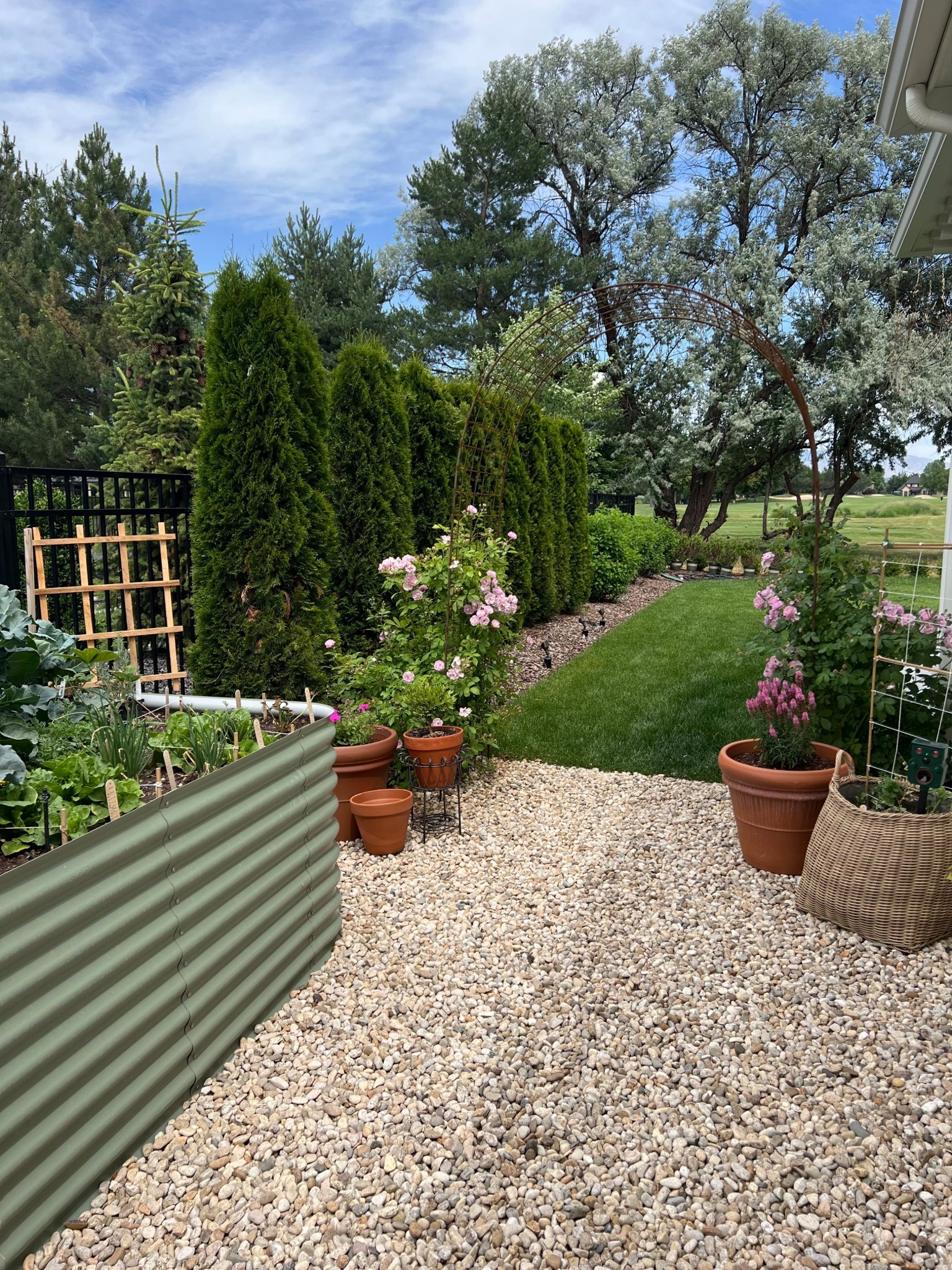 Garden things 🤎 My fav corner lately. 
Love this wicker basket because it is specifically for outdoors so it can be in the sun all day and get wet and it still looks brand new. #garden 

#LTKHome #LTKSeasonal