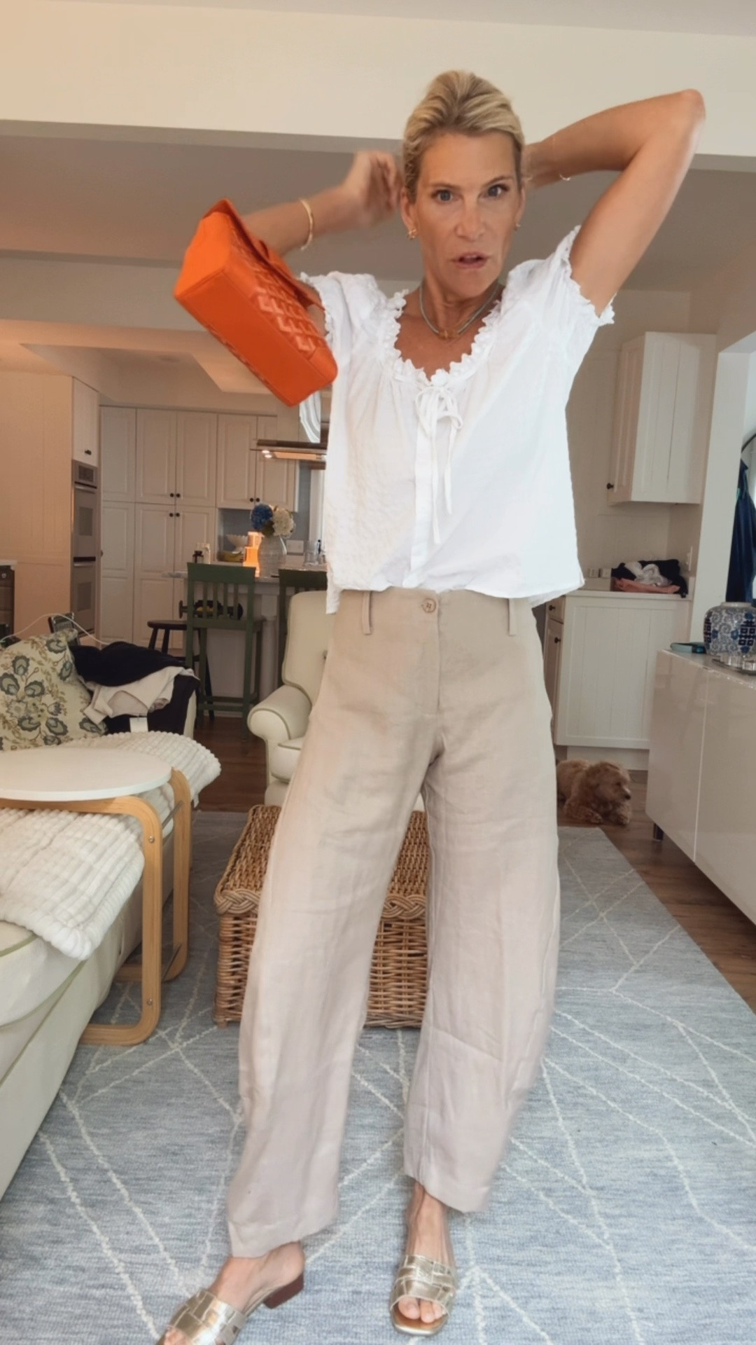 Beige linen pants that make you look 5 pounds skinnier!  Pairing with gold flat sandals, a white peasant blouse and my “borrowed” Goyard  mini bag!   To borrow the bag for as long as you want, use code: ANGELAHOWENSTEIN

#LTKootd #LTKOver40 #LTKTravel