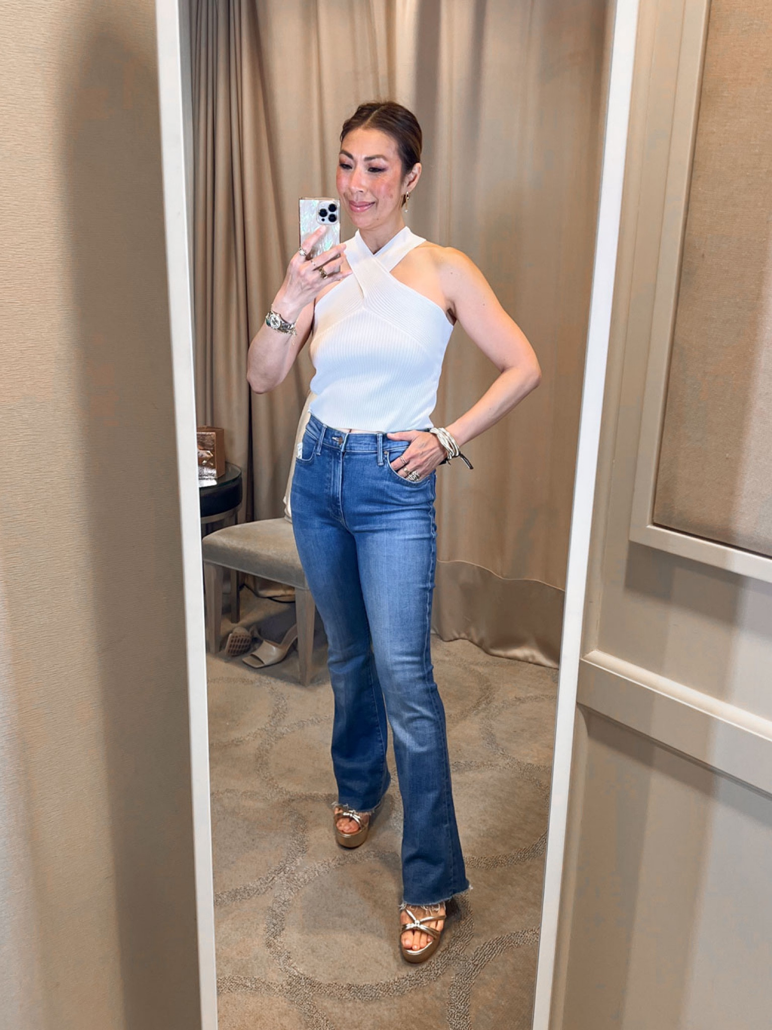 White halter x neck top & flare jeans (size 26) 

#LTKshoecrush #LTKunder100 #LTKxNSale