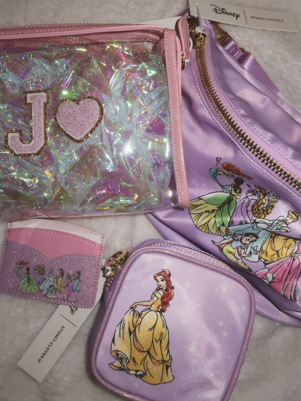Was gifted some stunning pieces from Stoney Clover Lane’s Revamped Disney Princess Collection! 💗✨👸🏽 I love the details so much. The sparkly trim and heart shaped zippers are healing my inner child and making me feel like royalty  

This collection is launching tomorrow, 12/7, at 10 am est! 

Ig: @jkyinthesky & @jillianybarra

#disney #disneystyle #disneyprincess #princessbelle #beautyandthebeast #disneyaccessories #disneycreator #disneyblogger #disneyfashion 

#LTKItBag #LTKTravel #LTKStyleTip