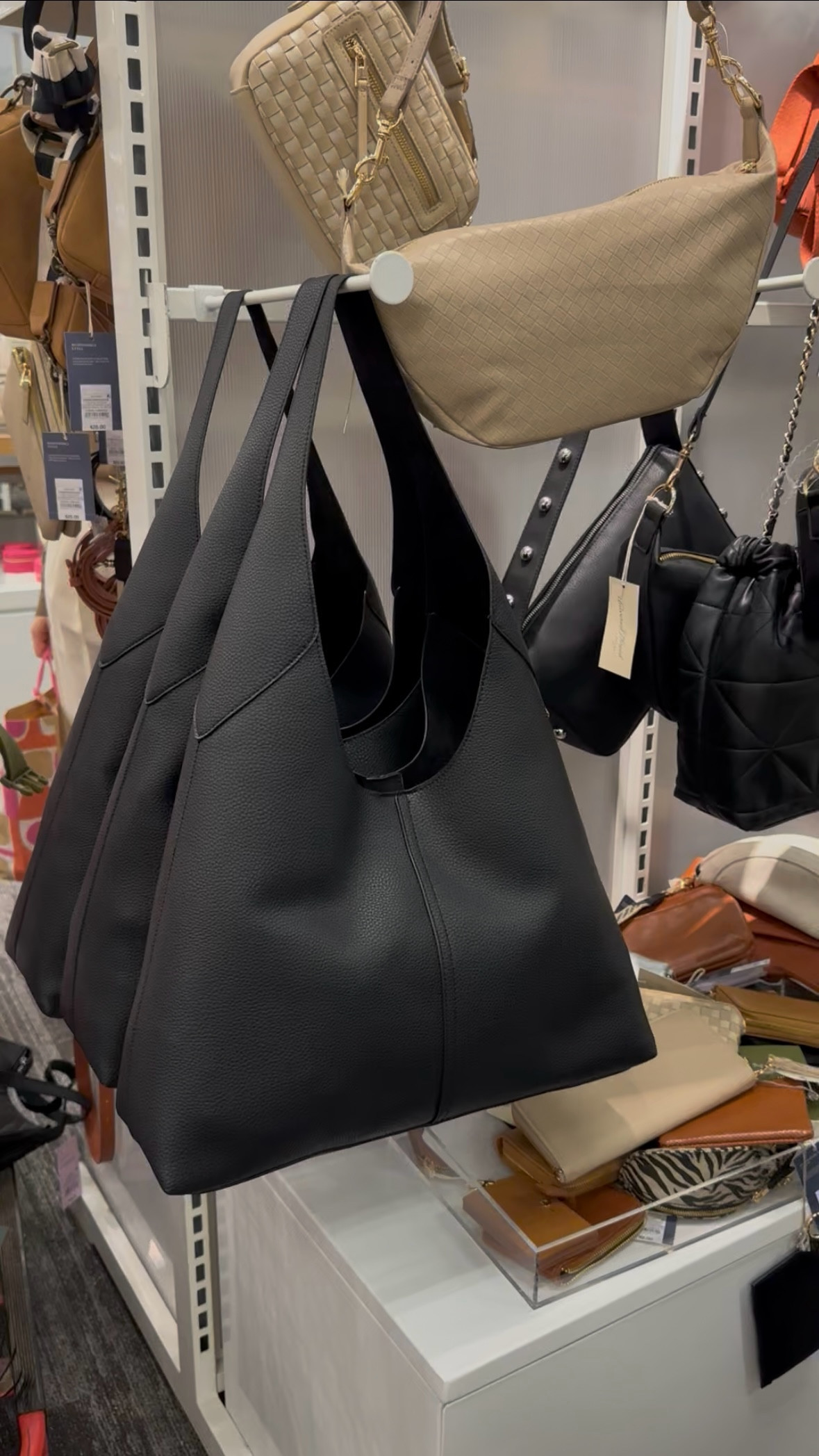 Great look for less from Target! It’s just slightly smaller than the popular, more expensive brand’s version and under $50! Also comes in cream. Magnetic closure and super spacious inside. This would make a great mom bag for anyone looking to ditch the diaper bag.

#LTKStyleTip #LTKItBag #LTKFindsUnder50