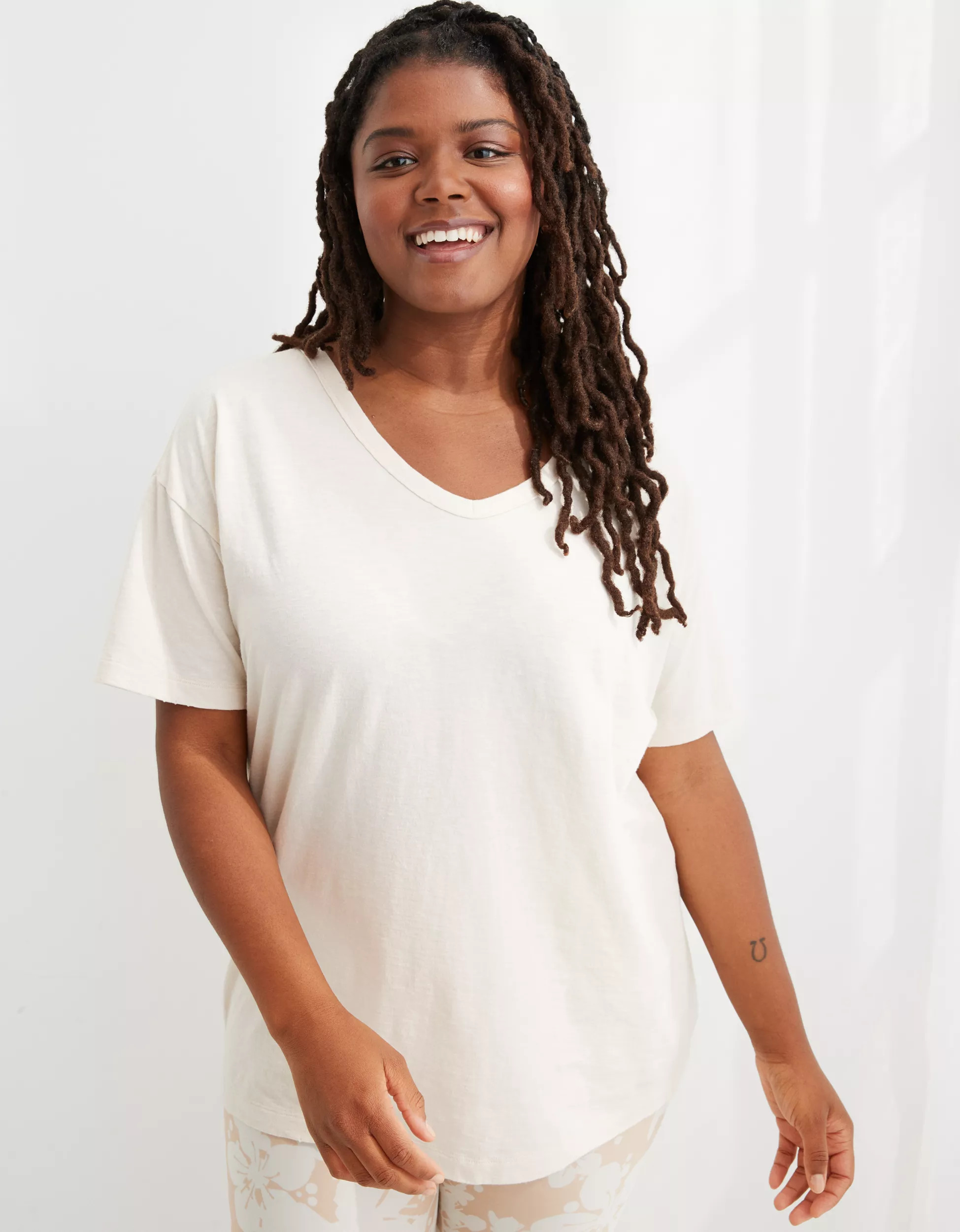 Aerie Distressed V-Neck Oversized Boyfriend T-Shirt | American Eagle Outfitters (US & CA)