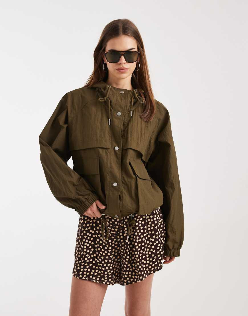 ASOS DESIGN shower resistant rain wear parka jacket in olive-Green | ASOS (Global)