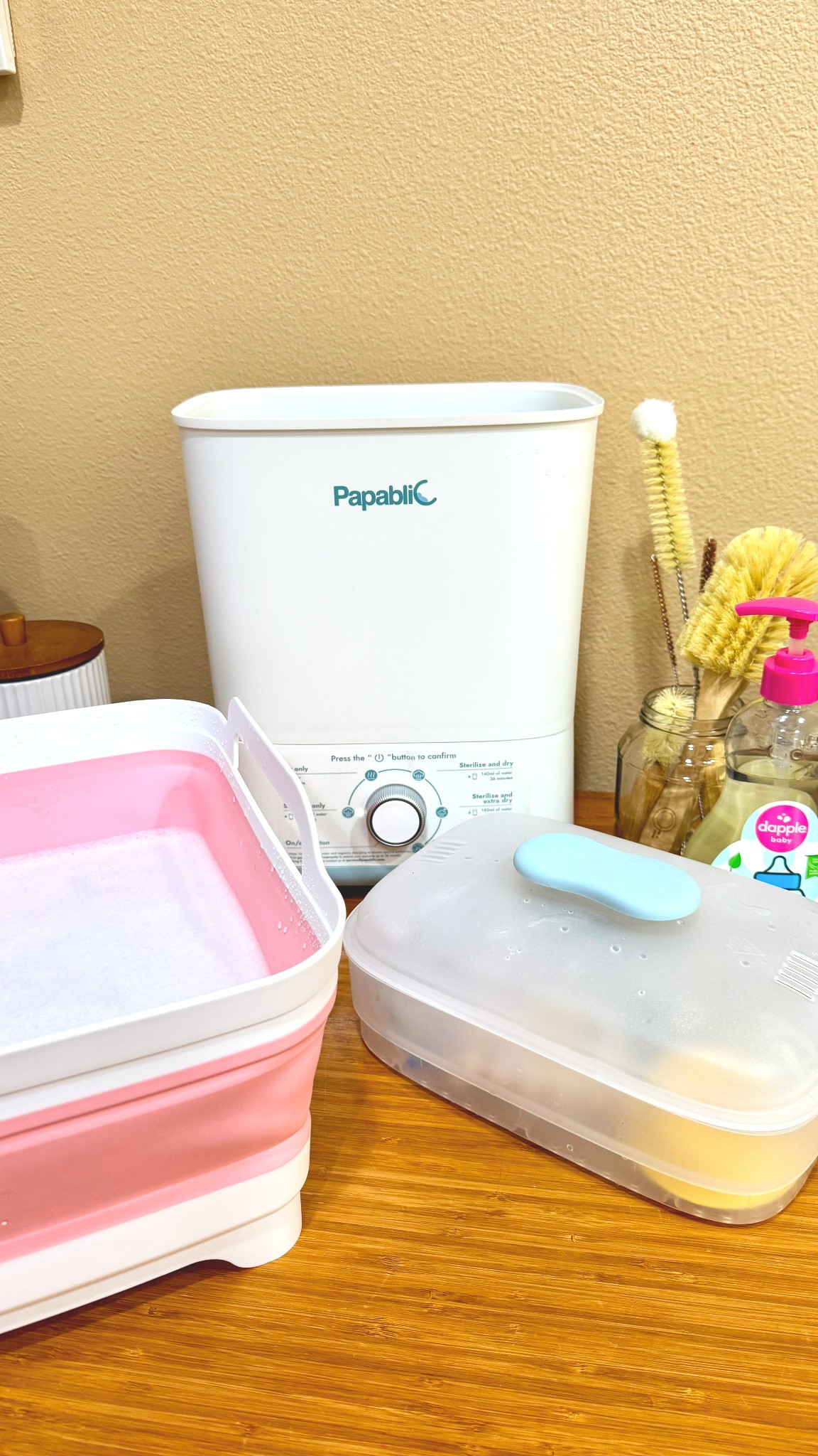 my baby bottle washing station set! 🌸🫧💗 with my favorite affordable bottle sterilizer, non toxic bamboo brush set, a dish basin to keep bottles from the germs of our sink, and dapple baby bottle soap of course! 🫧🤭 

#LTKBaby #LTKFamily #LTKKids