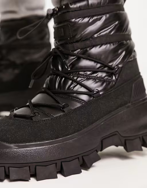 ASOS DESIGN puffer chelsea boot on chunky sole with lace detail in black wet look nylon | ASOS (Global)
