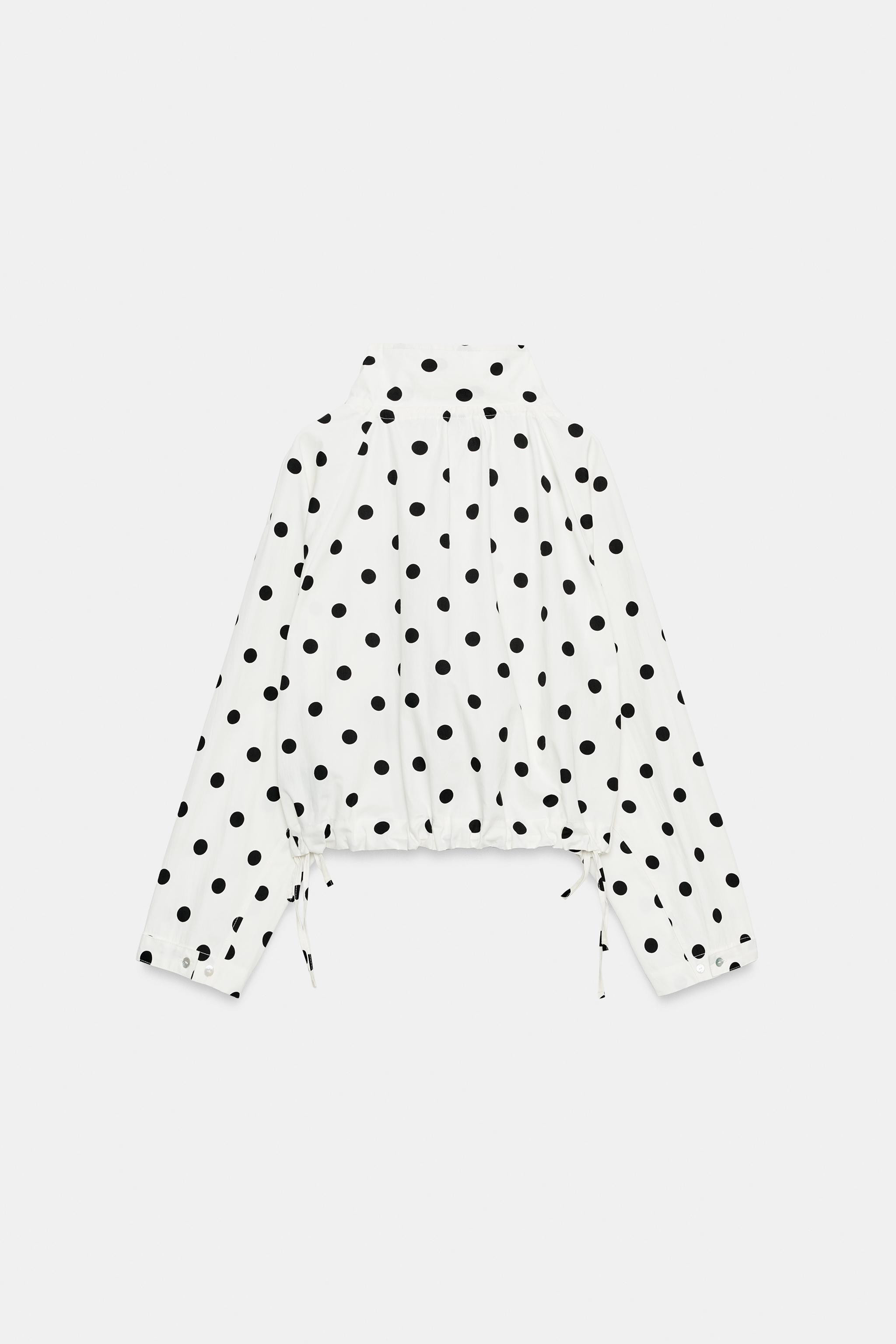 Jacket with an adjustable high neck with a tie. Long sleeves. Side pockets. Adjustable hem with t... | Zara UK