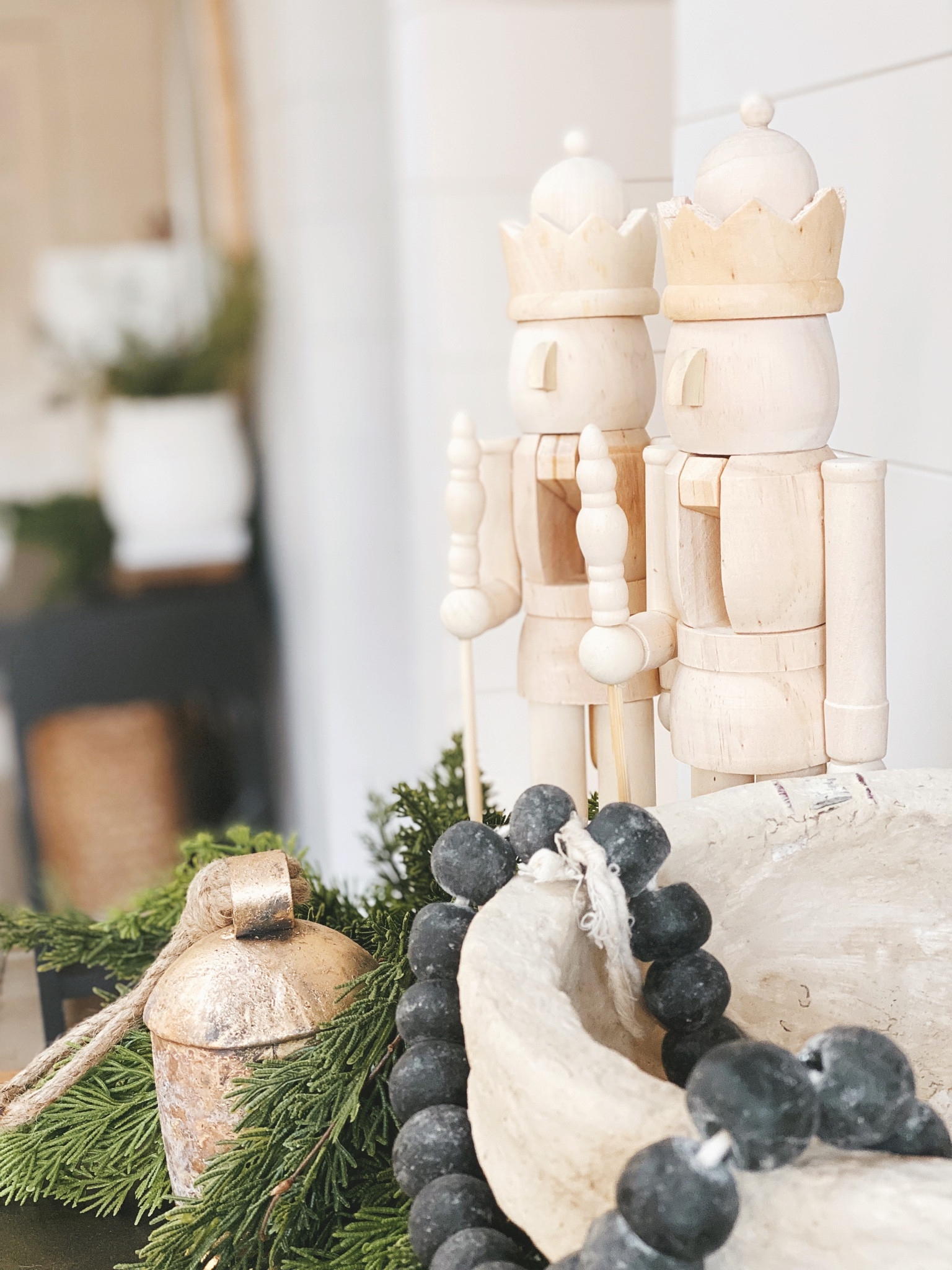 Wooden Christmas nutcracker decor with gold bells and garland console styling 🌲 #nutcrackers #christmasdecor #garland

#LTKHoliday #LTKhome #LTKSeasonal