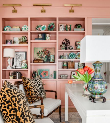 For a home office with main character energy, look no further! Make your space as bright and fun as you with…
- Coral Paint on your walls
- Gold accent lights and pulls
- Turquoise lamps
- Velvet Leopard pillows
- An extendable dining table as a desk

#LTKstyletip #LTKhome