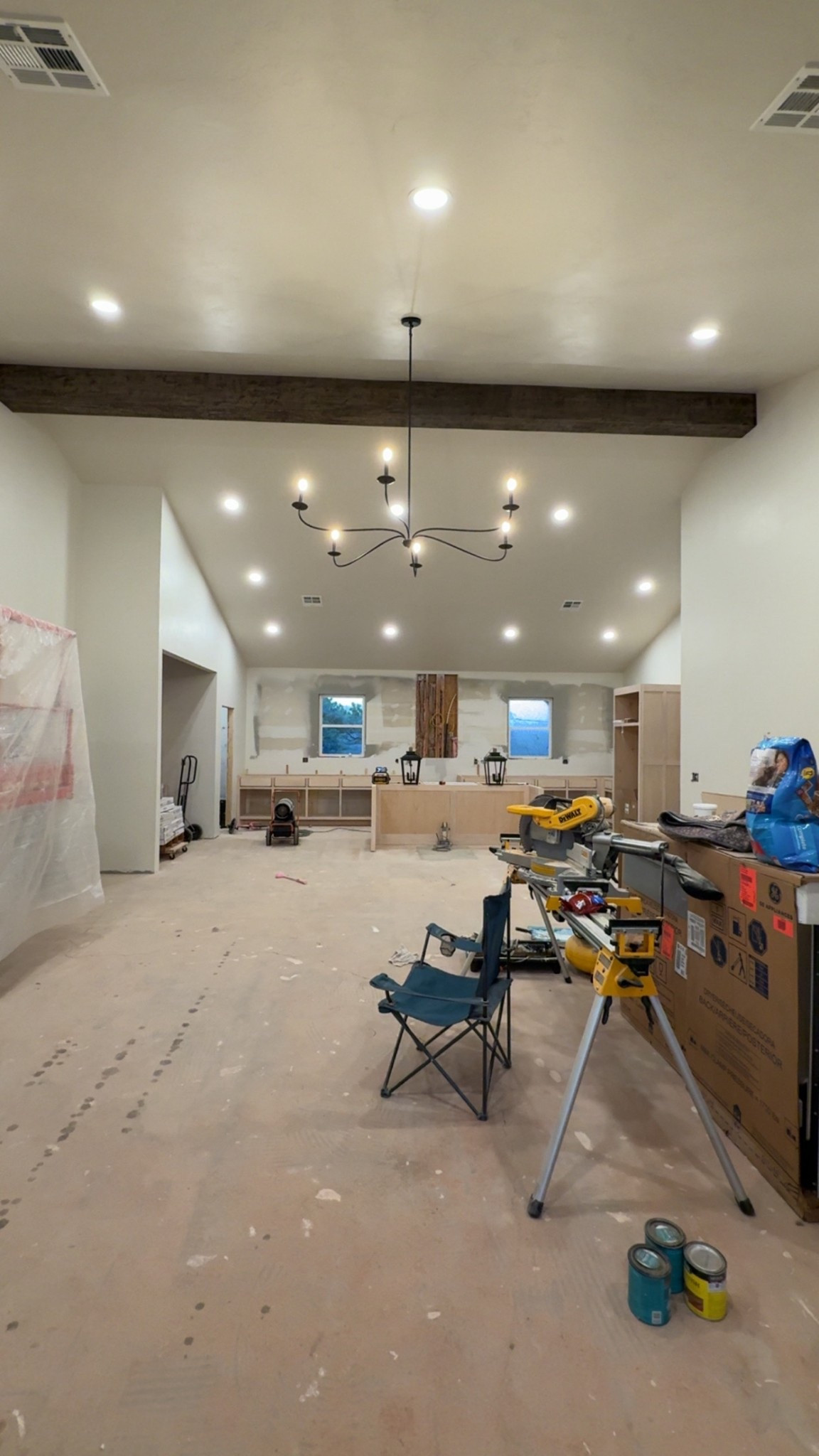 Flip house progress! Travis built our beam and hung. Check out my beam tutorial saved to my highlights on Instagram! This is the same chandelier in my home. I love it so much I bought it twice! Also linking the planter lights I chose for over the island. Affordable and beautiful! Cottage vibes! 

#LTKHome