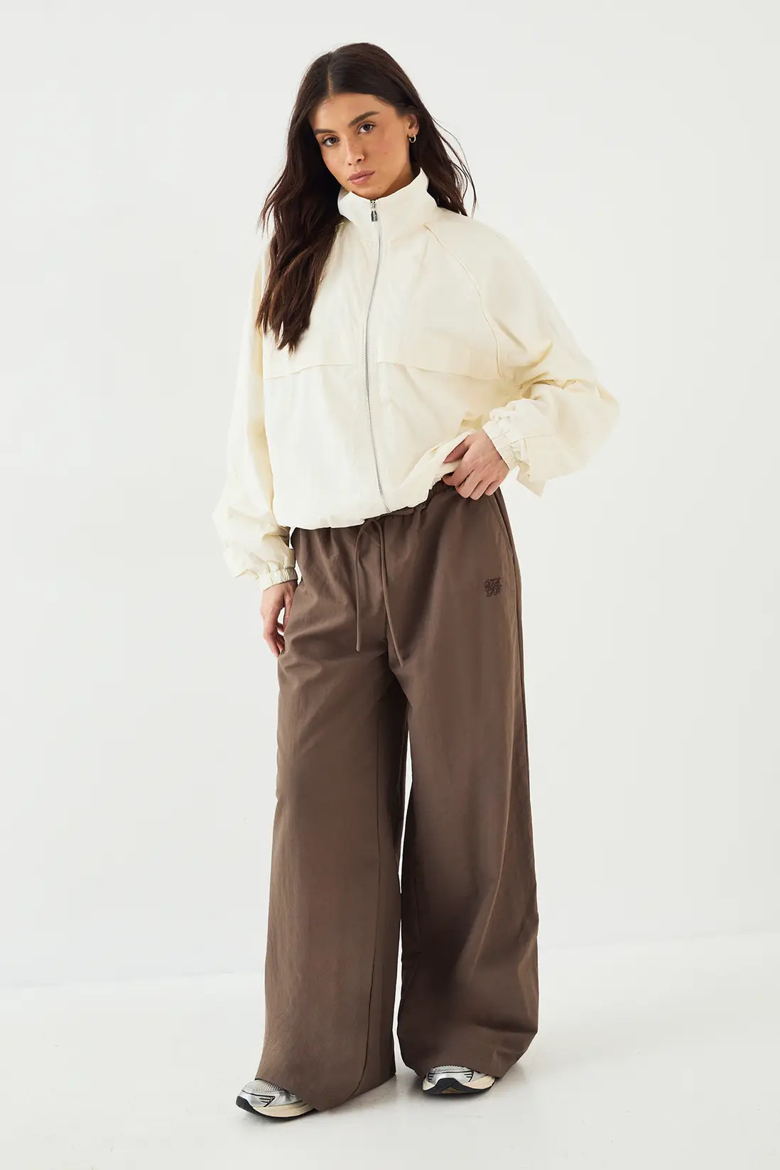 Cream DSGN Studio Nylon Zip Through Funnel Neck Track Jacket | Boohoo USA | boohoo (US & Canada)