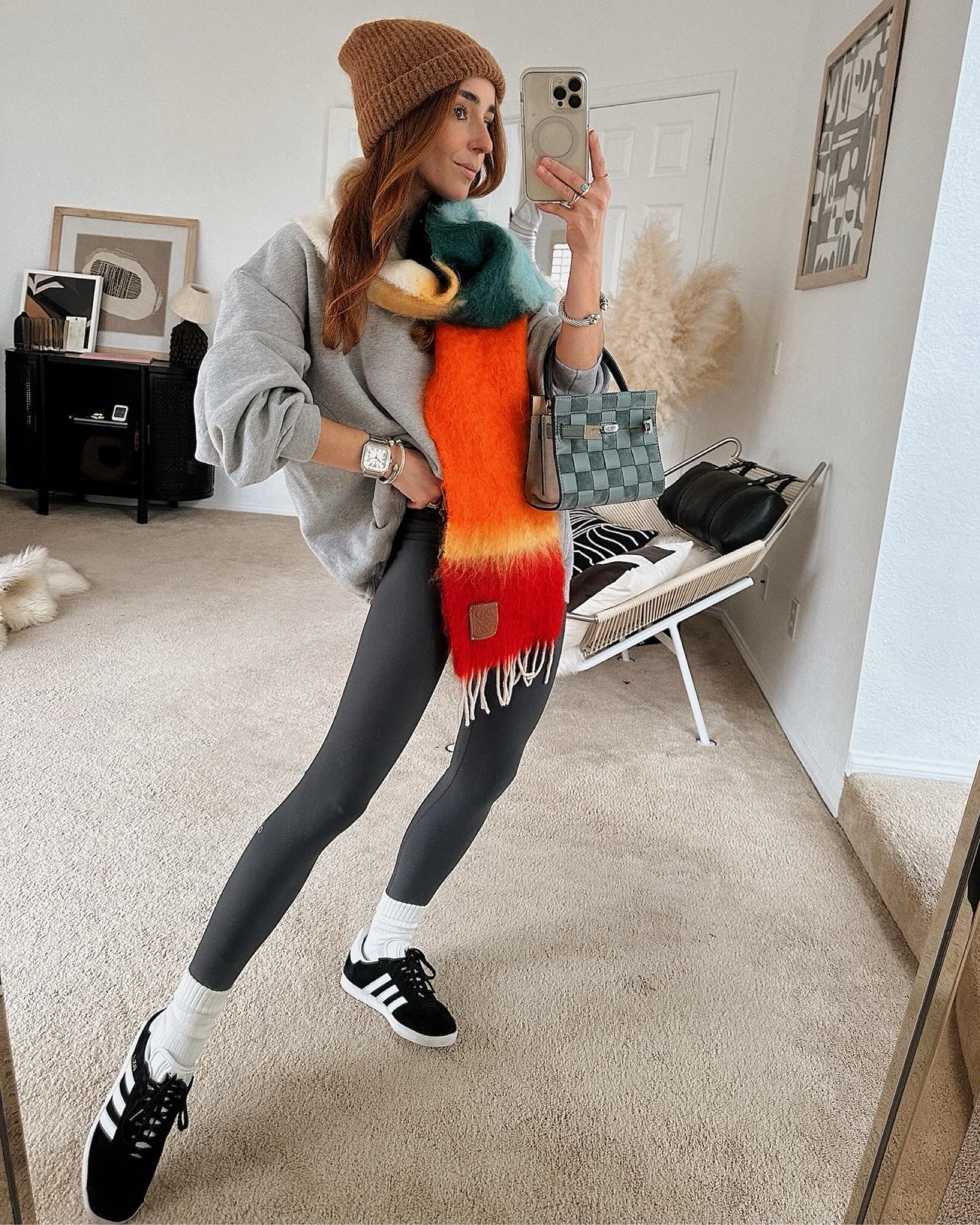 A neutral outfit meets dopamine dressing moment. I love the contrast of a sleek neutral base elevated via a fun statement detail, like this mohair rainbow scarf. It takes basics to a whole new sartorial height. 

Style Tip: Go with a tonal look and find a contrasting piece in both texture and color to really make your outfit pop. Plus, luxe scarves make for the ultimate stocking stuffer gift!

#LTKHoliday #LTKstyletip #LTKGiftGuide