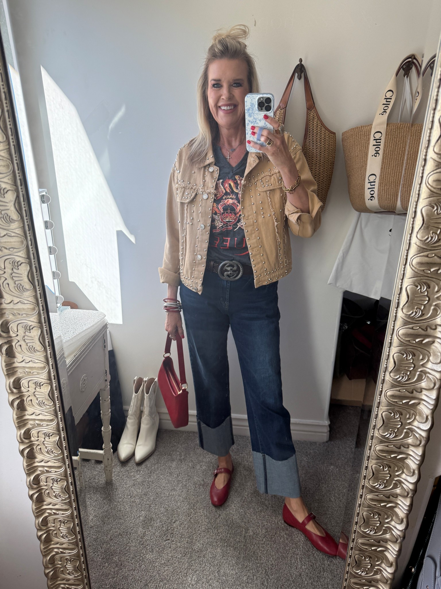 Queen Concert tee 
Outfit inspo…
Tee
Jacket 
Jeans
Are all Amazon finds 

Jacket fits tts I Am in a small 
Tee I am in a med, super soft, vneck and $10
Jeans In 27 med 

Red Mary Jane’s Madewell 
If in between sizes, size up 

Red handmade to ores custome made by Laudi Vindi 

Belt old 

Silver hoops, silver cross, silver bean necklace Tiffany (linked designer inspired) 

Kendra Scott necklace 

Bracelet Budha girl red bangles 

On right wrist 3 abbot lyon bracelets 



#LTKStyleTip #LTKFindsUnder50 #LTKOver40