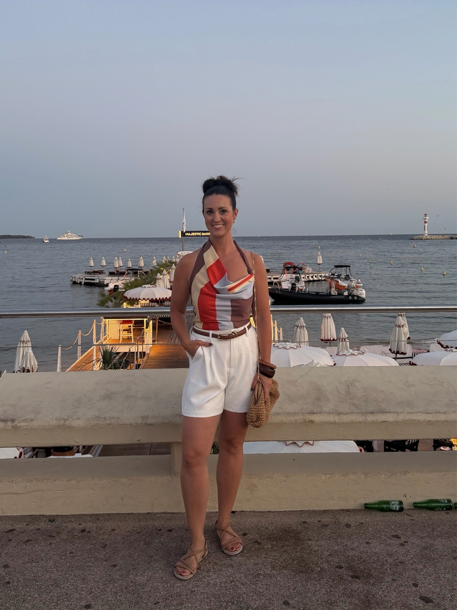 Dinner in Cannes! High waisted white summer shorts with fun dressy halter top! Love the asymmetrical lines.

#LTKOver40 #LTKootd #LTKTravel