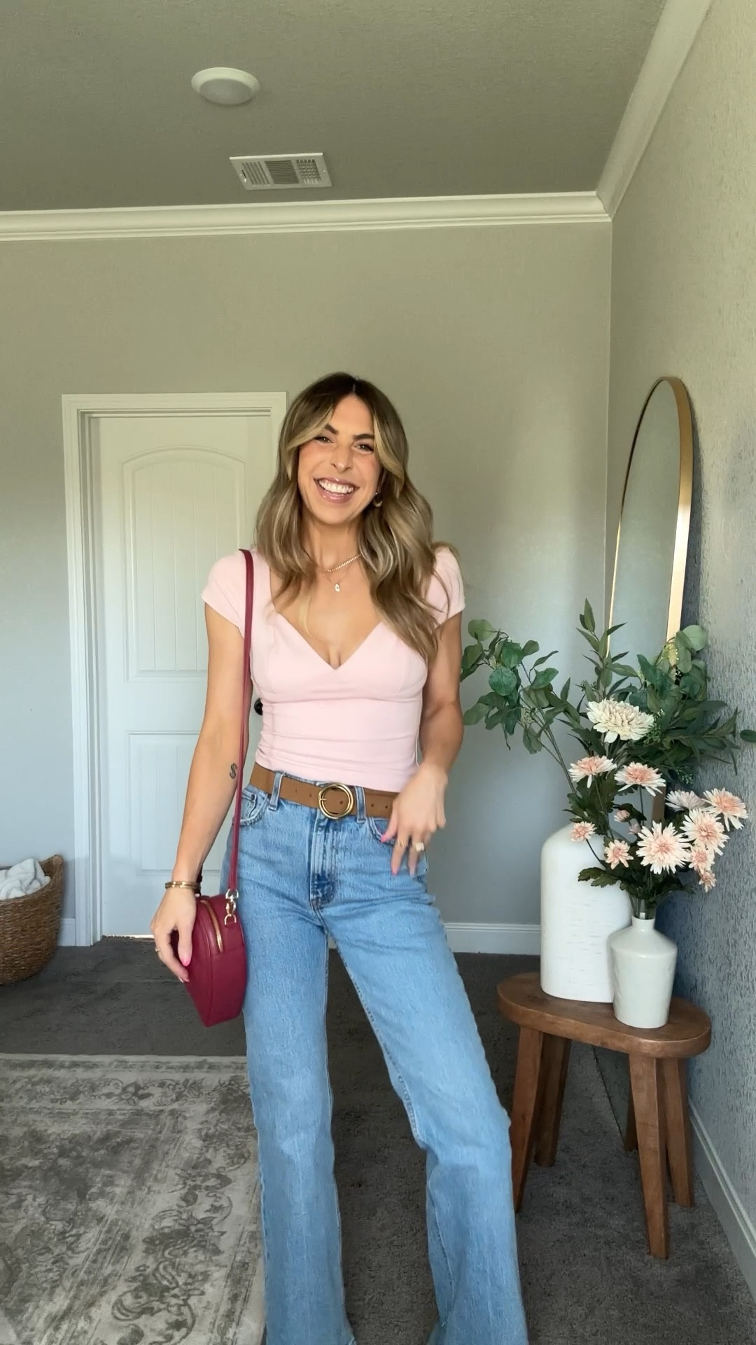 wearing my usual size small in this cutie top from amazon!! only $15 and so stretchy! wearing a 26 in the flare jeans. target bag and belt, amazon booties!

#LTKSaleAlert #LTKFindsUnder50 #LTKFindsUnder100