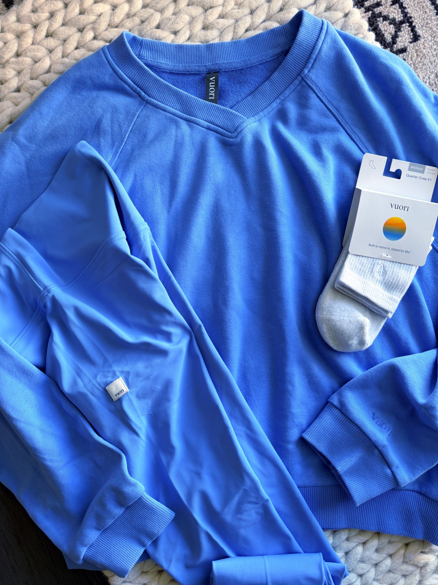 Rivera blue is the perfect summer color. Bright, clean, & it looks unreal with a summer tan.

I sized up to a large in the v-neck so I could wear it slightly off the shoulder & layer it over sports bras or tanks. It gives that effortless oversized feel without looking sloppy, which is the whole goal. This set is one of those you’ll keep reaching for on repeat.

vuori haul - vuori outfit - rivera blue - summer outfit - athleisure style - oversized sweatshirt - v neck sweatshirt - off the shoulder look - casual outfit - everyday style - elevated basics - matching set - lounge outfit - travel outfit - sporty chic - effortless outfit - minimal style - soft loungewear - summer athleisure

#LTKU #LTKfitnessgoals #LTKActive