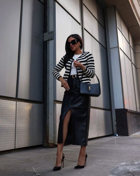 Spring workwear outfit ideas 
Nordstrom faux leather midi skirt with slit wearing a size 0
Mango striped cardigan wearing an XS
Saint Laurent bag and sunglasses 



#LTKSeasonal #LTKstyletip #LTKworkwear