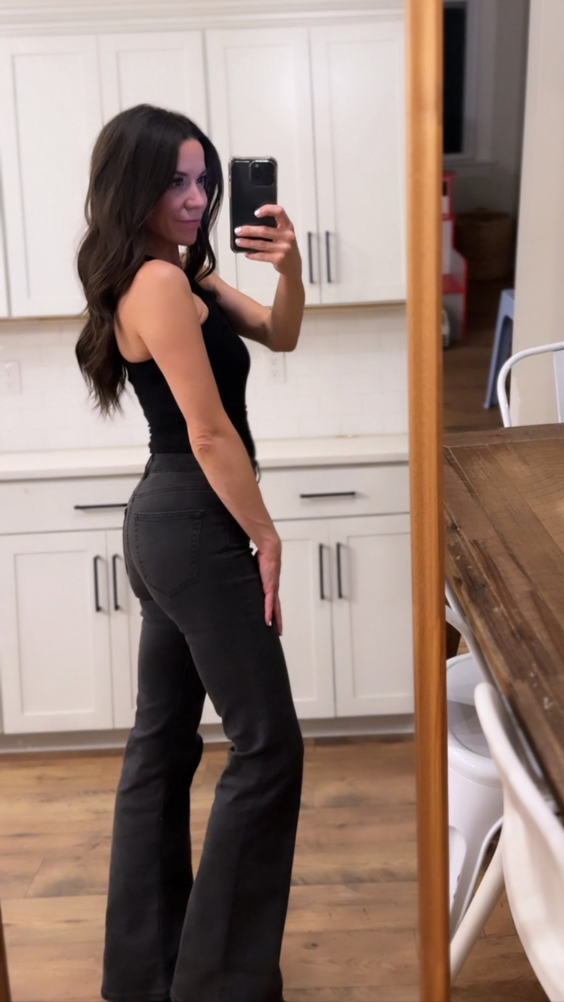 My new favorite black denim. 👏🏻👏🏻👏🏻 high waisted flare. Perfectly stretchy and structured where you need it. 10 out of 10!

#LTKmomlife #LTKWorkwear #LTKgrwm