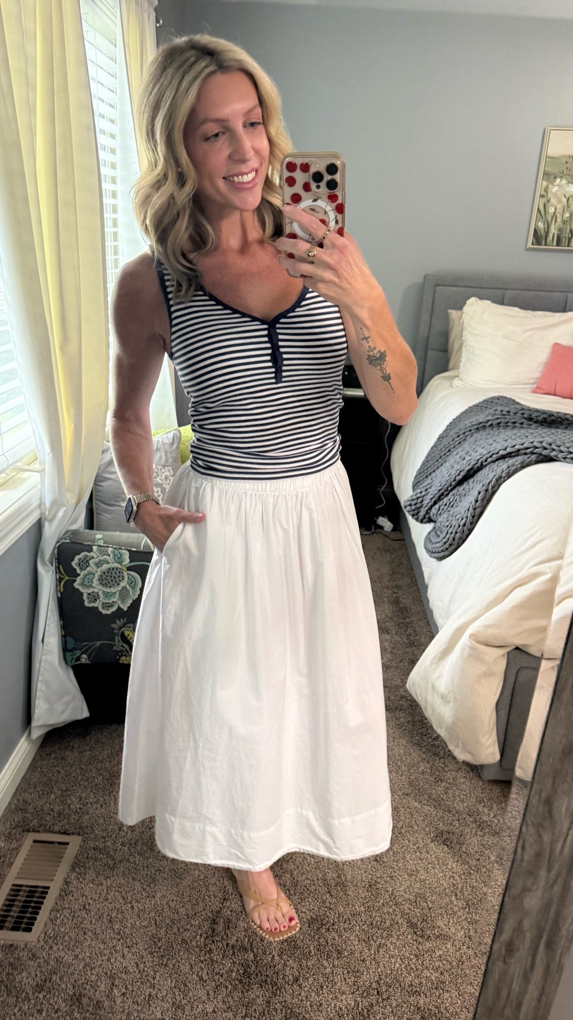 The perfect summer fit by @Aritzia . Loving the poplin skirt, it’s so lightweight and airy! I paired it with a simple striped henley tank and sandals! Wearing a S in the skirt and a M in the tank.

#LTKOver40 #LTKSeasonal #LTKootd