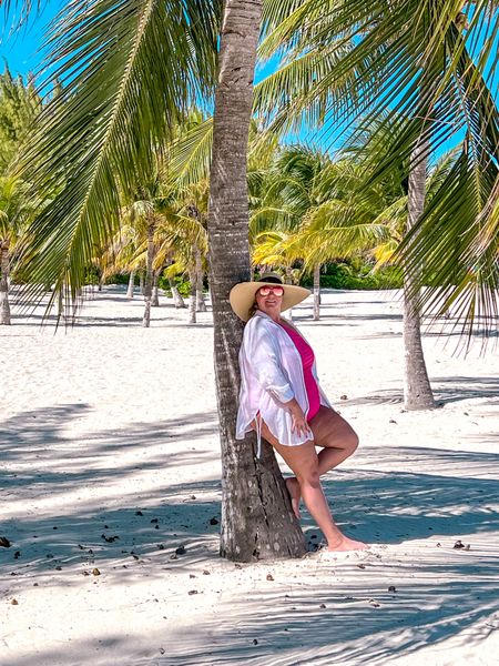 A perfect one shoulder swimsuit for the beach! I love the bright color in this hot pink and it has a ruched front which is very flattering. Styled here with a beach swimsuit cover up. 

#LTKSeasonal #LTKplussize #LTKswim