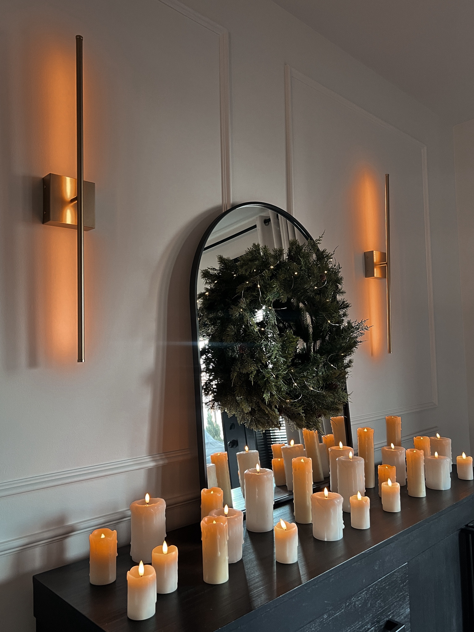 Cozy and simple Christmas dining room sideboard cabinet styling. Loving these real wax flameless candles for that extra cozy ambiance 🤎

Christmas decor, sideboard Christmas decor, console table Christmas decor, table lamp, moody decor, moody dining room, Christmas dining room,  Christmas tree,

#LTKSeasonal #LTKHome #LTKCyberWeek