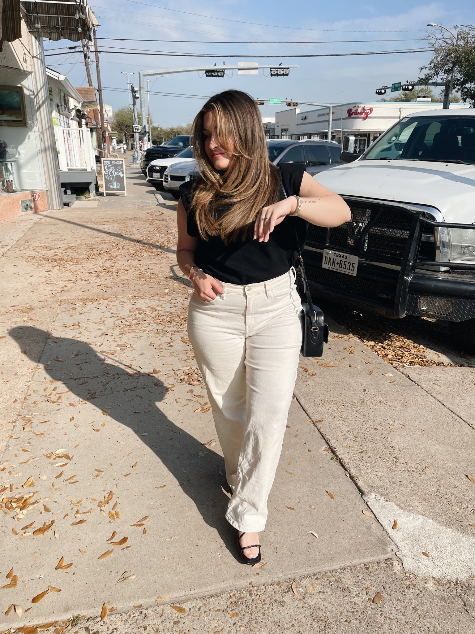 Perfect day for a pair of white denim jeans and a casual top. Style tip: Match at least 2 pieces of your outfit whether it’s your blouse and shoes or jacket and bag. That way your look has some color cohesion. 🌟 Black and white outfit.

#LTKsalealert #LTKstyletip #LTKfindsunder50